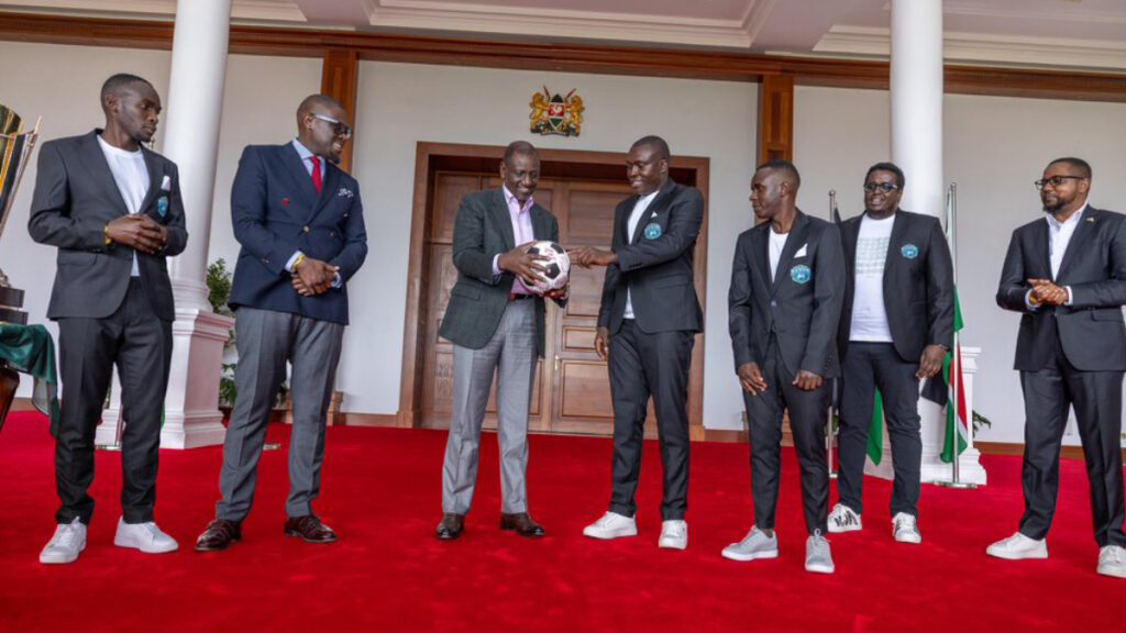 Nairobi United players with President Ruto at State House after FKF Cup victory