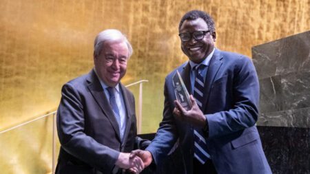 Dr. Kennedy Odede receiving the 2025 United Nations Nelson Mandela Prize at UN Headquarters