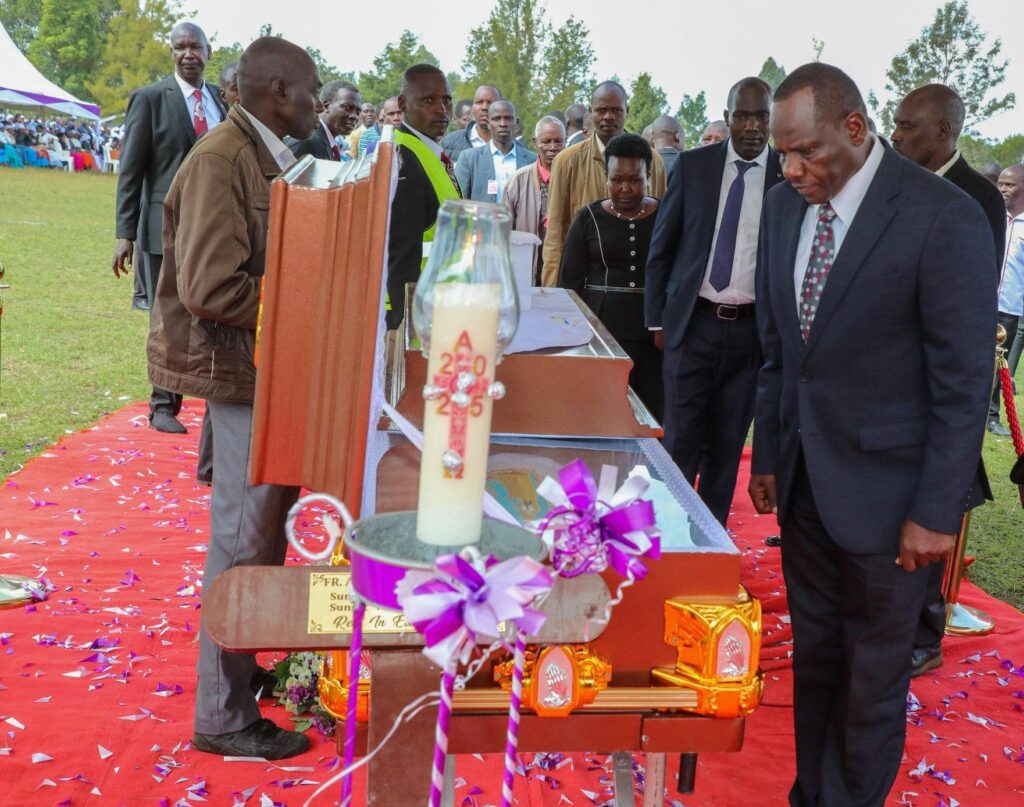 Governor Jonathan Bii Chelilim, Nandi County pays his last respects during the burial of of the late Fr Allois Cheruiyot Bett