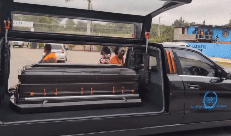 A funeral hearse carrying the remains of Albert Ojwang.