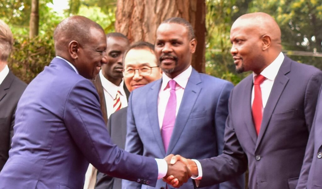 Moses Kuria with President William Ruto during a past engagement