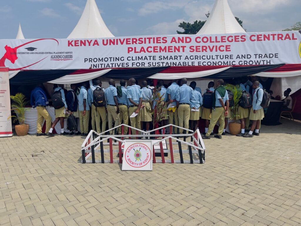 Students at a KUCCPS stand